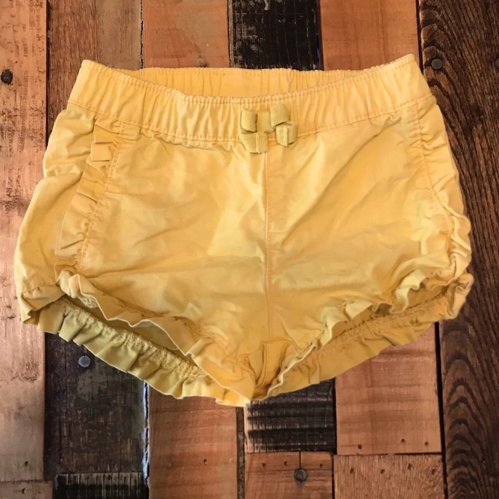 5/$25 Baby Girl Ruffle Yellow Shorts • Ruffled • Pockets • Elastic